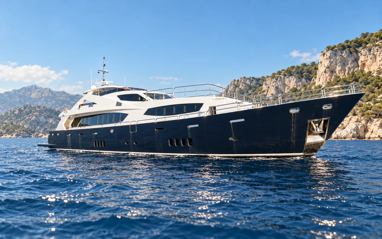 SMYRNA as launched in 2012, seen in profile at anchor